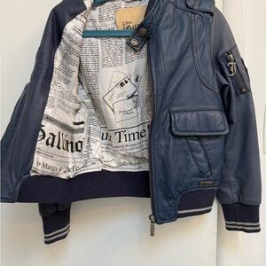 Navy blue lambskin leather jacket.